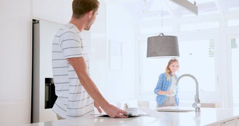 Couple Enjoying Breakfast Ritual in Bright Modern Kitchen
