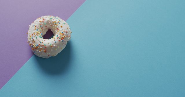 White Icing Donut with Sprinkles on Colorful Background - Download Free Stock Images Pikwizard.com