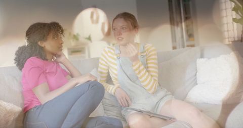 Teen Friends Relaxing Together at Home