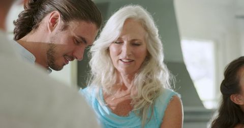 Joyful wedding celebration with friends toasting champagne