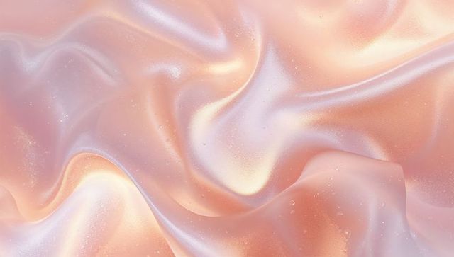 Iridescent peach satin fabric draped close-up with pearly sheen and glittering folds