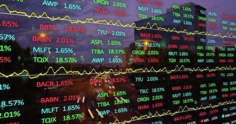 dynamic stock market data display with blurred night traffic - Download Free Stock Images Pikwizard.com