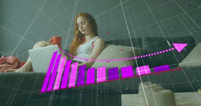 Young Woman Analyzing Data on Sofa with Virtual Graphs Displayed - Download Free Stock Images Pikwizard.com