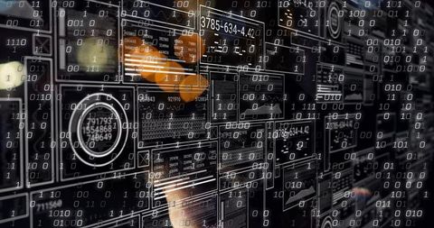 Binary data dashboard wall featuring control room monitors and technician reflection