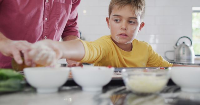 Father and Son Preparing Food Together in Kitchen - Download Free Stock Images Pikwizard.com