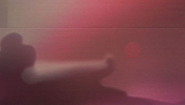 Silhouetted rocky red sunset with scan lines