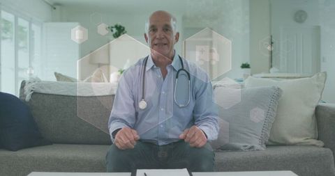 Senior Doctor During Medical Video Call with Digital Elements