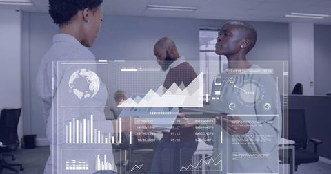 Business Professionals Discussing Digital Data in Busy Office