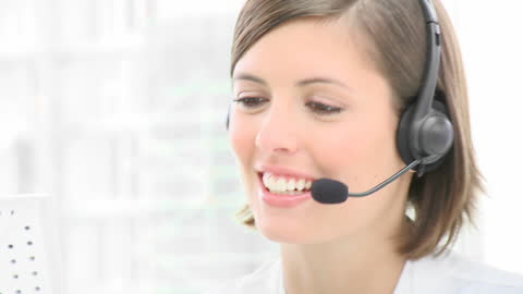 Smiling Call Center Employee Providing Customer Support