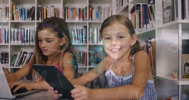 Young Students Using Technology in School Library
