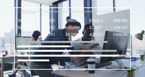 Business Professionals Collaborating Analyzing Data with Digital Interface