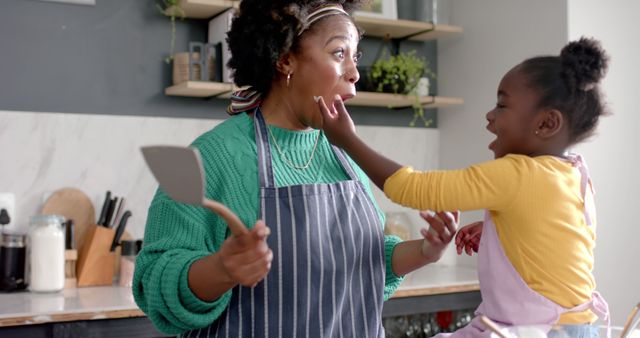 Joyful Mother and Daughter Cooking in Kitchen - Download Free Stock Images Pikwizard.com