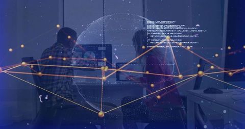 Coworkers collaborating around monitors with holographic globe and digital network overlay