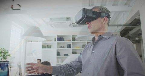 Professional Experiencing Virtual Reality in Modern Office