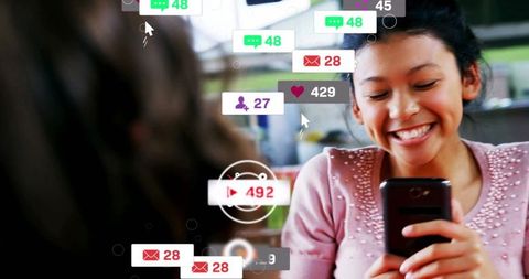 Teen Enjoying Social Media Interaction in Cafeteria Atmosphere