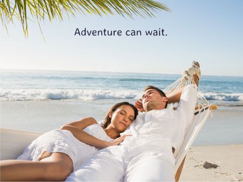 couple relaxing in hammock by sea representing tranquility - Download Free Stock Templates Pikwizard.com