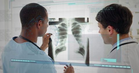 Doctors Discussing X-Ray Analysis and Data Interface - Download Free Stock Images Pikwizard.com