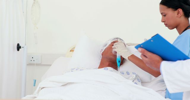 Nurse Checking Vital Signs of Patient in Hospital Bed - Download Free Stock Images Pikwizard.com