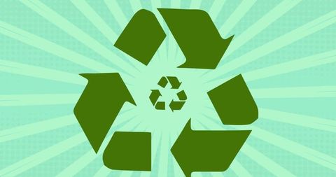 Green recycling symbol on eco-friendly background