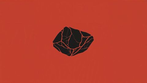 Mystic floating black gemstone with vibrant red fissures