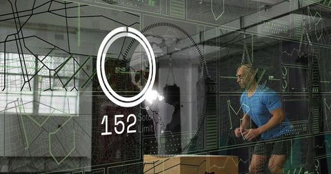 Man hitting heavy bag with futuristic hud overlay in daylit gym