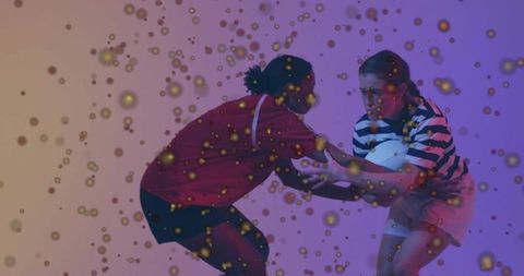 Female athletes competing and contesting ball amid gold confetti, high-energy rugby duel