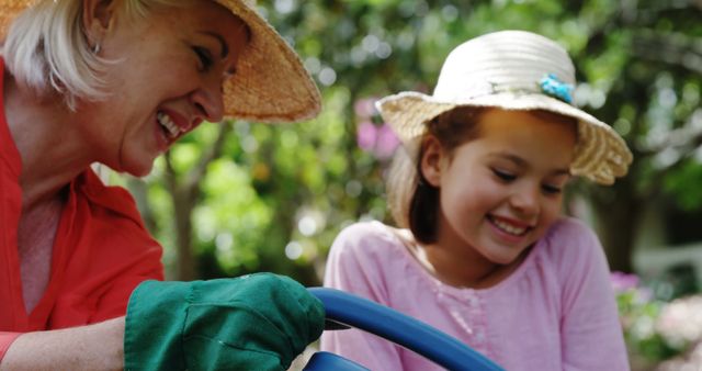 Grandmother and Granddaughter Gardening with Joy - Download Free Stock Images Pikwizard.com