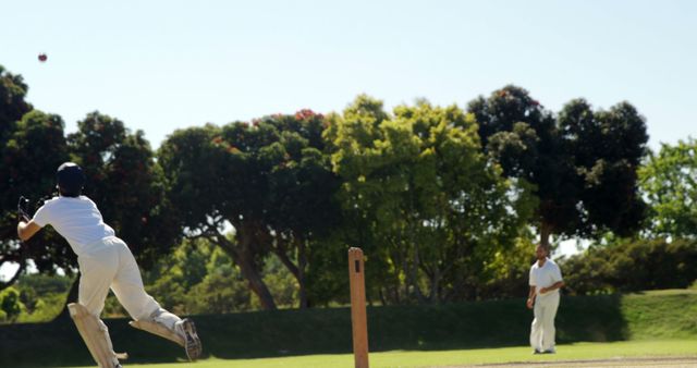 Batsman Playing Cricket Match Against Clear Sky - Download Free Stock Images Pikwizard.com