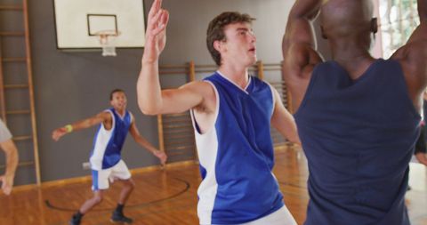 Intense Game Action on Indoor Basketball Court - Download Free Stock Images Pikwizard.com