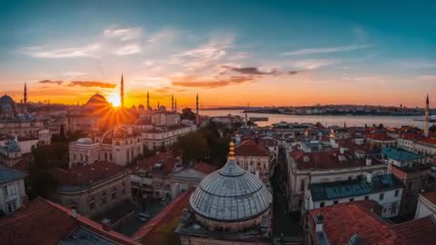 Sunrise Unfolding Over Historic Istanbul Harbor Revealing Domes, Minarets and Red Rooftops