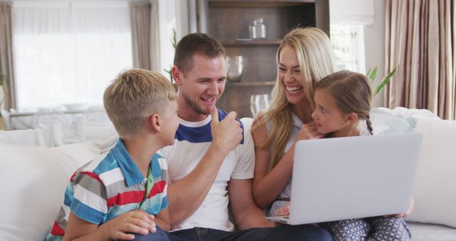 Happy family bonding over laptop on weekend - Download Free Stock Images Pikwizard.com