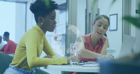 Diverse business meeting in casual attire with laptop