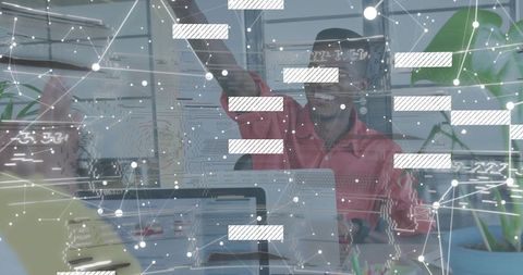 Tech team collaborating with holographic data overlay in modern open-plan office workspace