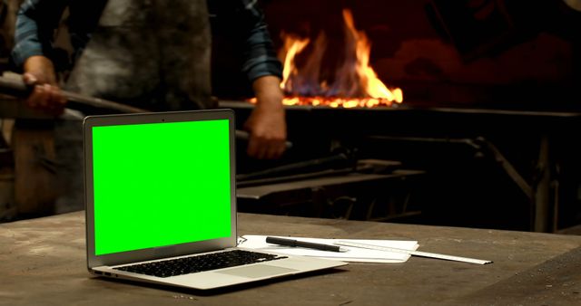 Laptop with Green Screen on Blacksmith Workbench - Download Free Stock Images Pikwizard.com