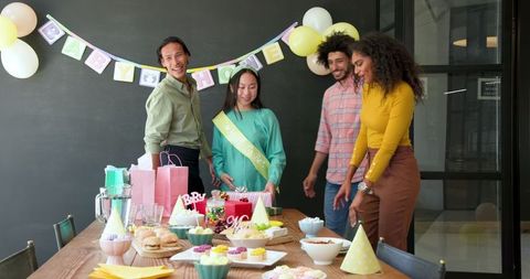 Colleagues Celebrating Office Baby Shower with Joy and Festivity