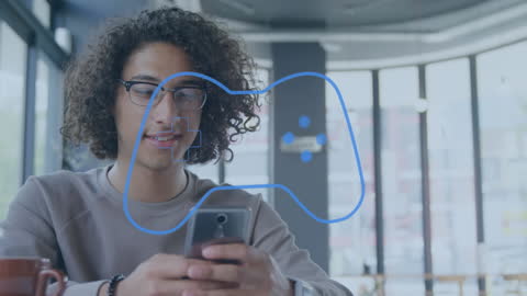 Man Enthusiastically Gaming on Smartphone with Digital Overlay