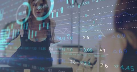 Female analyst pointing and interacting with transparent data dashboards and charts