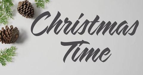 Christmas Time Text with Pine Cones and Foliage