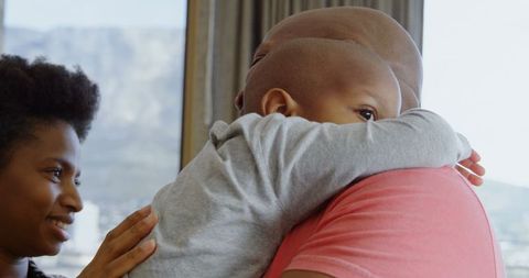 Loving Family Supporting Child at Home