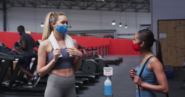 Women Wearing Masks Socializing in Gym - Download Free Stock Images Pikwizard.com