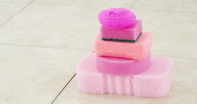 Assorted Cleaning Sponges Stacked on Tiled Surface - Download Free Stock Images Pikwizard.com