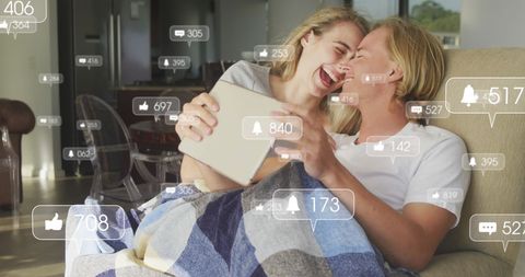 Happy Couple Embracing and Engaging with Social Media