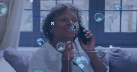 Senior Woman Engaging in Digital Communication with Futuristic Graphics