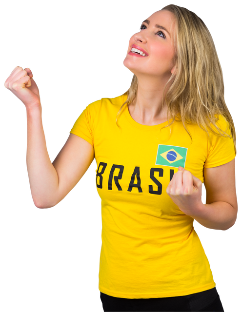 Excited Woman Celebrating in Yellow Brazil Football Tshirt, Transparent Background - Download Free Stock Videos Pikwizard.com