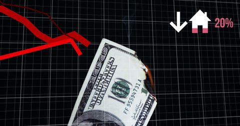 Financial crisis concept with burning dollar and plummeting graph