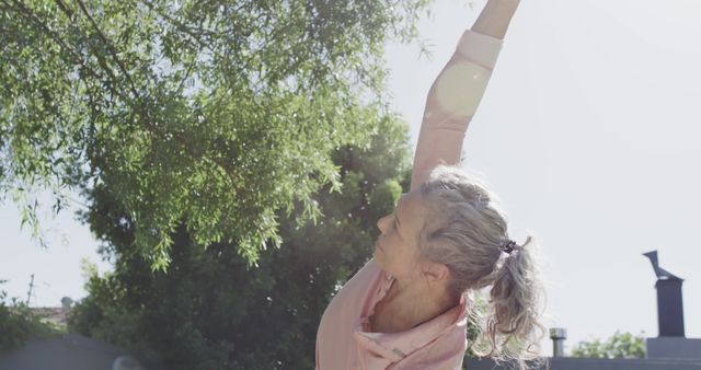 Senior Woman Practicing Yoga Outdoors in Sunlight - Download Free Stock Images Pikwizard.com