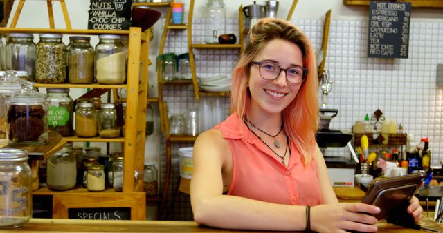 Smiling Barista Holding Digital Tablet in Cozy Café Interior - Download Free Stock Images Pikwizard.com