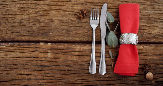 Elegant Table Setting with Silverware and Red Napkin on Rustic Wood - Download Free Stock Images Pikwizard.com