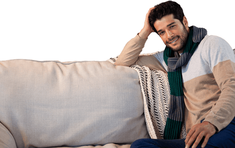 smiling man lounging on sofa in comfortable setting transparent - Download Free Stock Videos Pikwizard.com