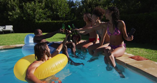 Group of Friends Celebrating with Drinks at Pool Party - Download Free Stock Images Pikwizard.com